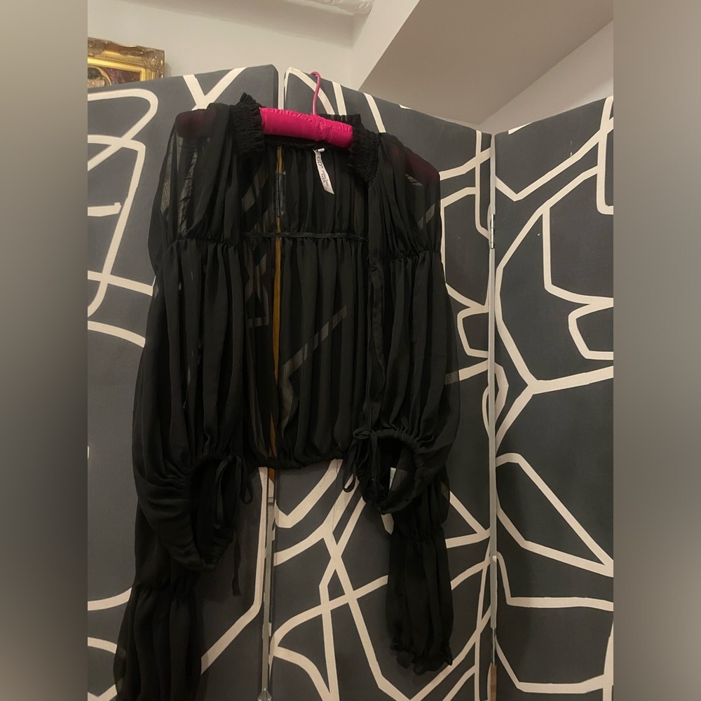 Black sheer pirate top with front opening and tie closure